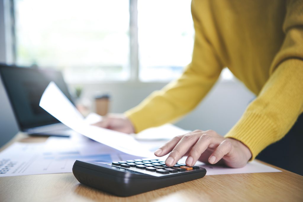 Business woman working in finance and accounting Analyze financi